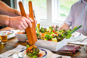 serving salad with two Earlywood Large Flat Sautes as salad forks